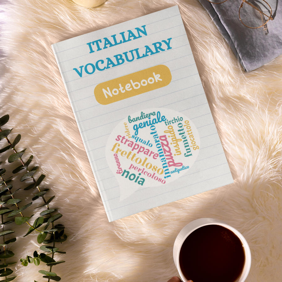 Italian Vocabulary Notebook on a fluffy base with cup of coffee